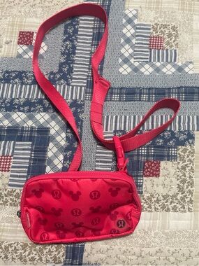 lululemon athletica Small Crossbody Bag in Bright Pink with Mickey Print